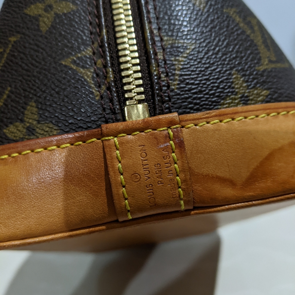 Louis Vuitton Alma PM Bag